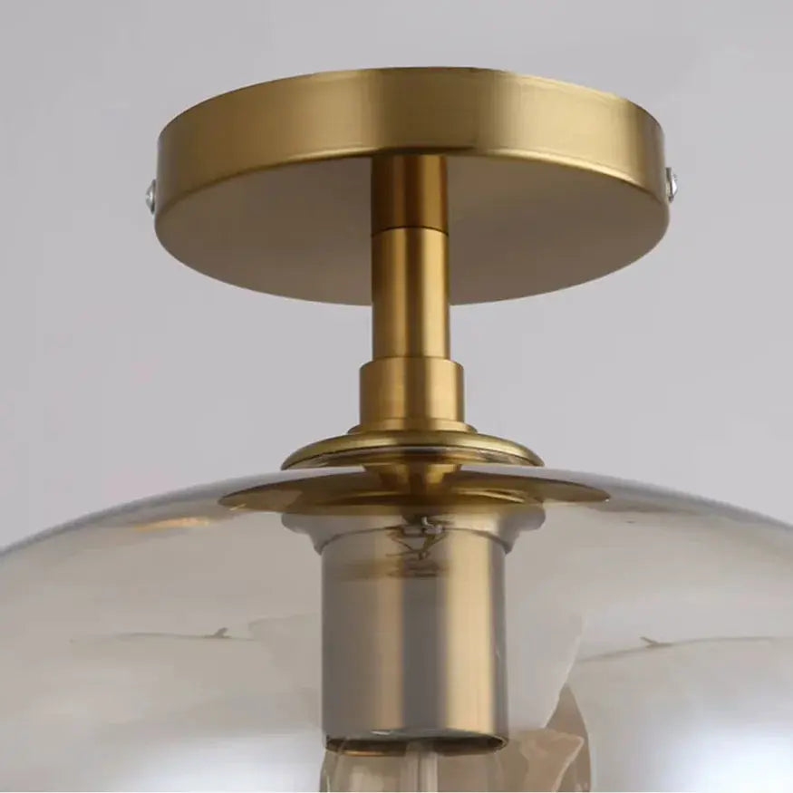 Luno — Plafonnier compact en verre et métal doré